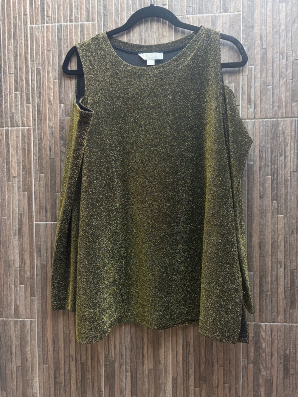Cold shoulder long sleeve green sparkle top. Perfect for special occasion